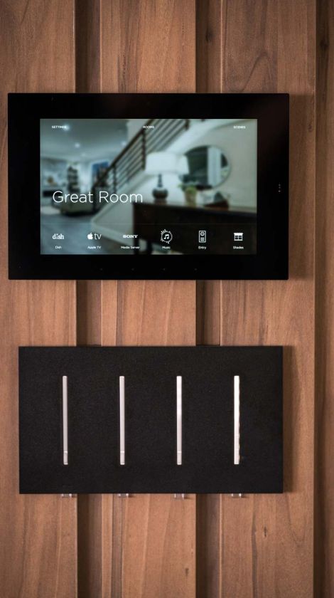 hand holding phone with alarm interface